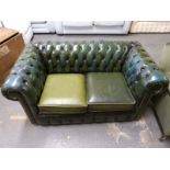 A green leather two-seat Chesterfield sofa (length 153cm)
