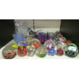 A collection of glass paper weights including Caithness together with other glass items