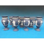Eleven Wedgwood Jasper ware vases in dark blue