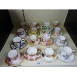 A large quantity of Royal Worcester decorative cups and saucers reviving old patterns