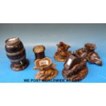 A quantity of black forest and other wooden items to include cache pots,