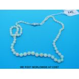 A single strand necklace of graduated opal beads,