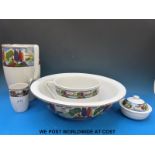 A five piece toilet set decorated with a landscape pattern possibly an early Clarice Cliff design
