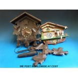 A Black Forest cuckoo clock and a weatherhouse type cuckoo clock
