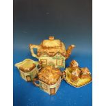 A Keele St Pottery Co teapot, milk jug and sugar bowl together with a Price Brothers cruet,