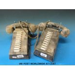 A pair of vintage internal telephones with options including stores, office,