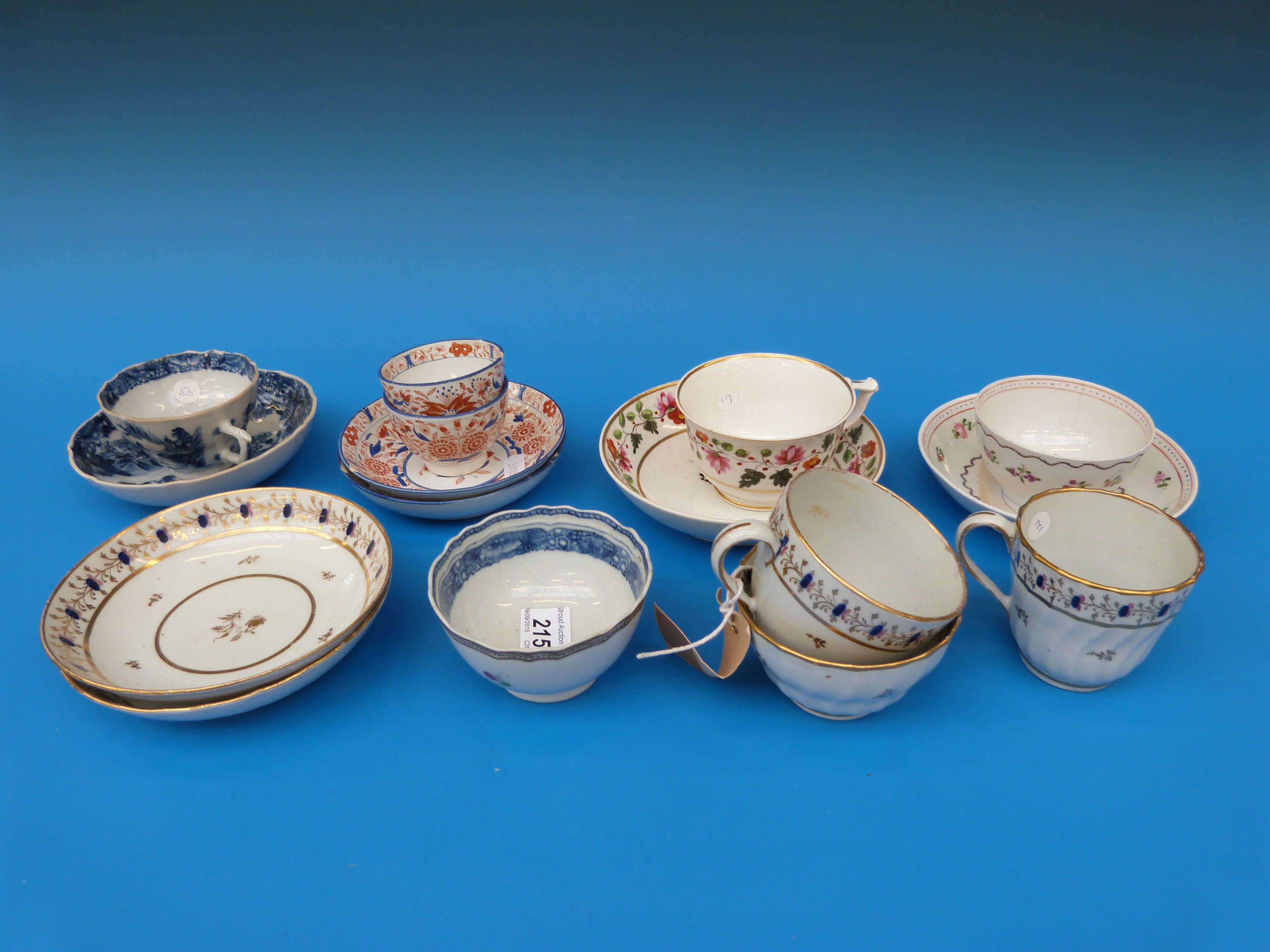 A quantity of first period/ 18thC porcelain including Worcester, Newhall, armorial tea bowl,