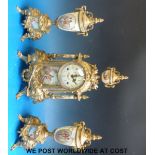 A French style clock garniture with movement by Franz Hermle, Germany, striking two bells,