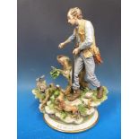 A large Capodimonte figure of a man with his shotgun