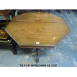 A 19thC ash or elm octagonal table with bobbin stretchers