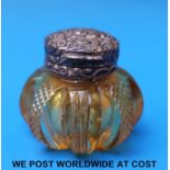A 19thC yellow cut glass miniature scent bottle with white metal hinged lid and inner pierced cover,