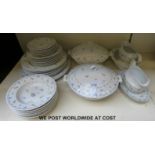 A six setting Royal Worcester dinner service in Ribbons and Bows pattern including meat dish,