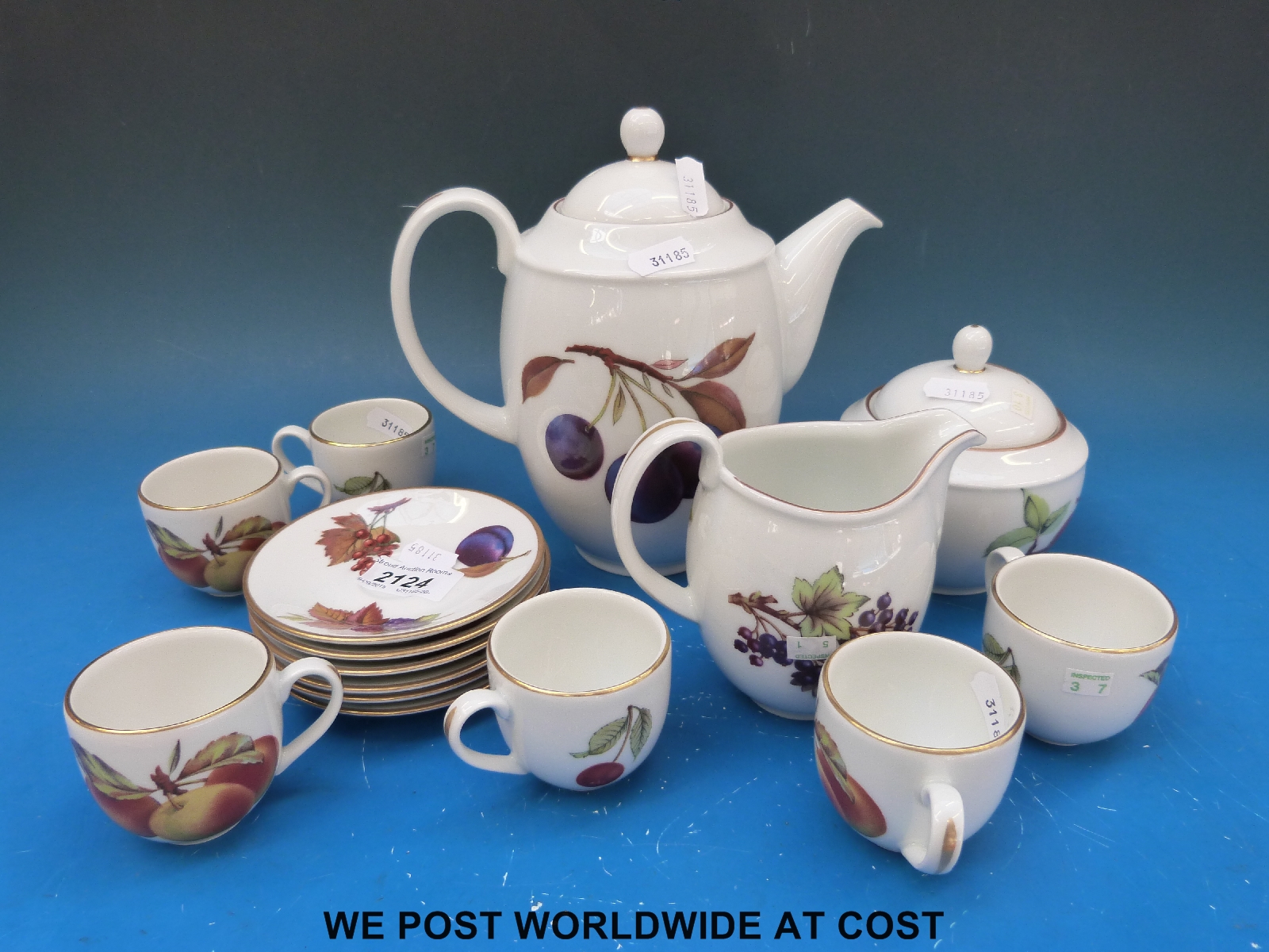 A Royal Worcester coffee service in Evesham pattern