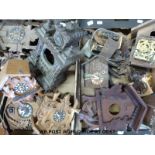 A carved mantel cuckoo clock case and several other cuckoo clocks with some spare parts and some