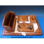 A leather desk set comprising six pieces