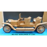 A wooden model of a Rolls Royce Silver Ghost, length 85cm,