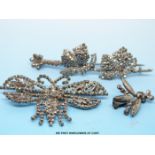 Two 19thC cut steel and white metal brooches one in the form of two flying butterflies with moving