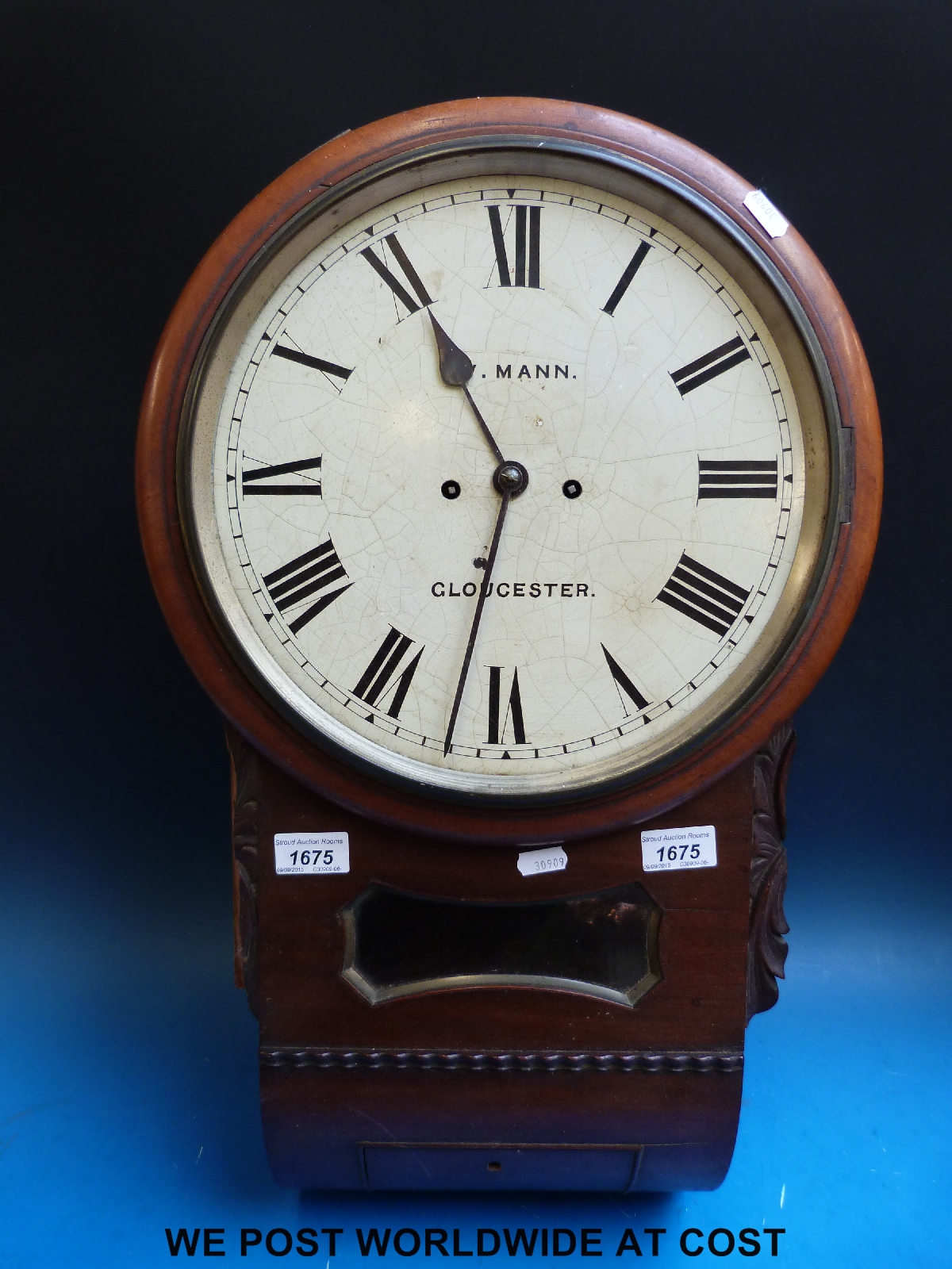 A mahogany drop dial wall clock with W.