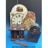 A Black Forest wall clock, a larger dial for spares or repair,