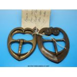 Two bronze buckles made from a carved original by Charles Erskine Clarke