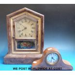 An American mantel clock chiming on a gong with two train movement together with a small Edwardian