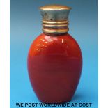 A carnelian ovoid scent bottle with gilt metal hinged top, 5.