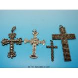 Three 19thC cut steel cross pendants and one other