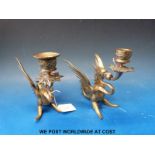 A pair of late 19th/ 20thC Gothic dragon candle/ chamber sticks (height 16cm)