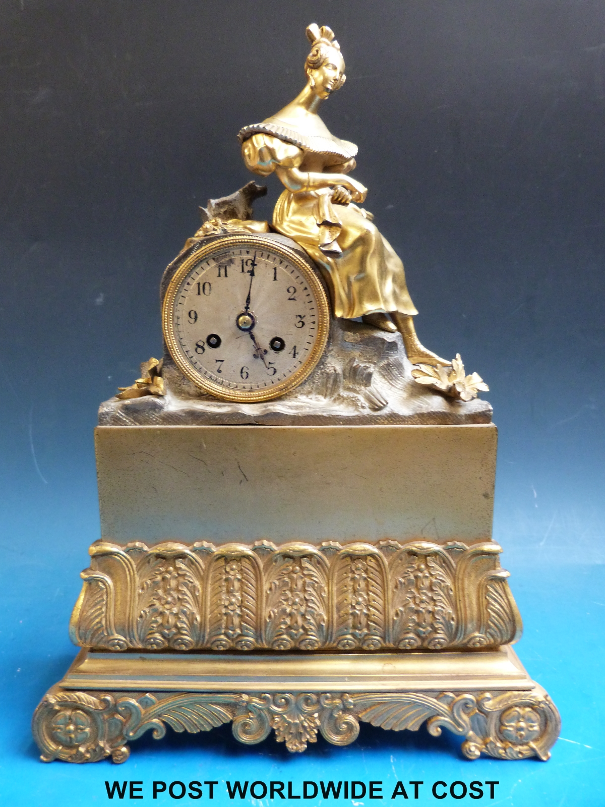 A French gilt figural mantel clock, the movement stamped C & C,