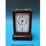 A Rollin of Paris rosewood and brass inlaid cased alarm carriage clock (height 18cm)