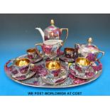 A quantity of Minton tea ware with hand decorated floral cartouches together with Eastern European