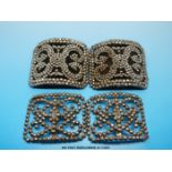 A pair of French cut steel shoe buckles decorated with overall scrolling detail made up of faceted