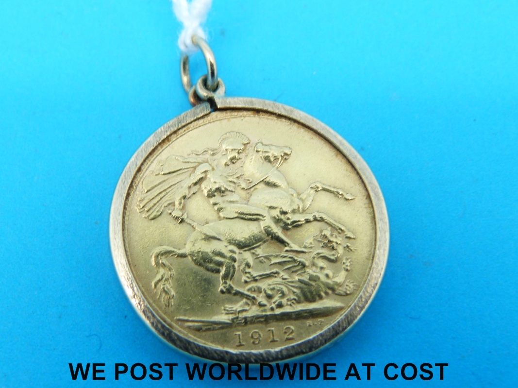 A 9ct gold mounted 1912 gold full sovereign (9.