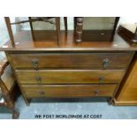 A mahogany chest of drawers and corner chair