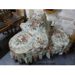 An upholstered 19thC trefoil conversation or love seat (h76cm,