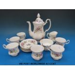 A Royal Albert coffee set in the Moss Rose pattern