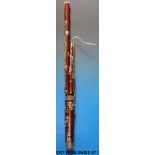 A cased Adler Sonara bassoon with maple body and silver plated furniture, model M1357/1,