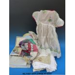 A collection of linen, lace and textiles including a patchwork skirt, Edwardian,