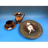 A painted ceramic bowl in metal frame together with a lustreware jug and a cup and saucer