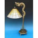 A Chinese brass dragon lamp (70cm tall)