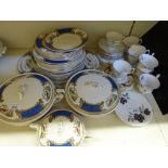 A quantity of dinnerware, tea cups and saucers including, Royal Albert,