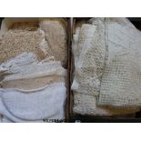 Two trays of linen, lace and fabric including large lace panels, 24 lace/net panels,