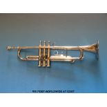 A cased silver plated trumpet by Trister India