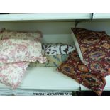 Two rolls of Kashmiri hand embroidered crewel work together with four embroidered cushions and