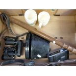 A wooden truncheon, folding camera,