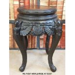 A Chinese carved wooden table / jardiniere stand (50cm tall,