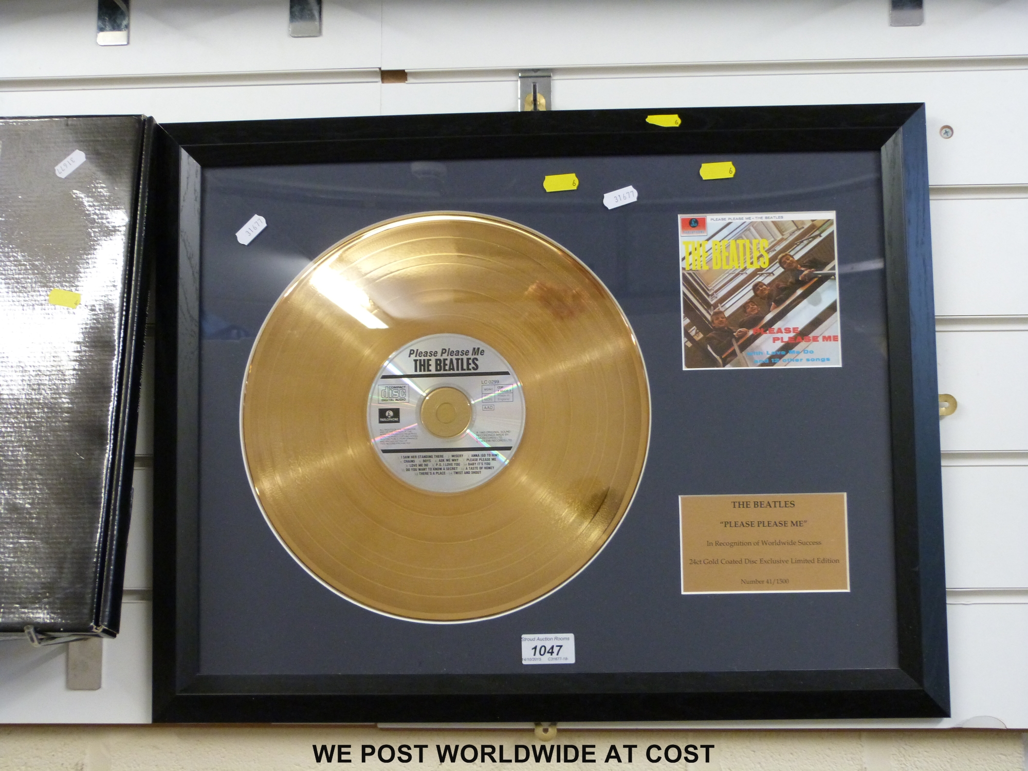 A framed (18” x 23”) “Gold” disc of The Beatles “Please Please Me” LP. - Image 2 of 4