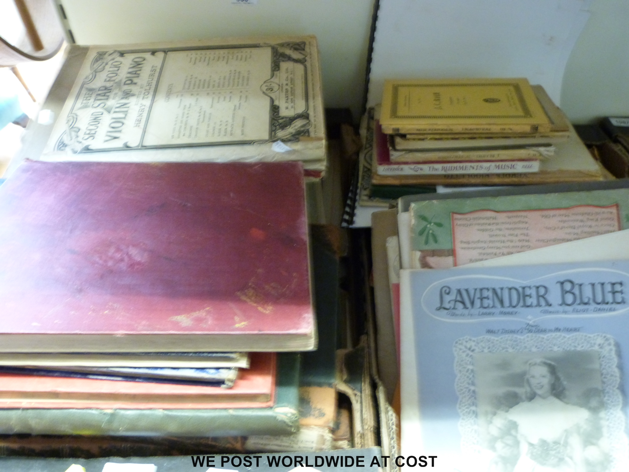 A large quantity of late 19th and early 20thC music books and sheets including piano, violin,