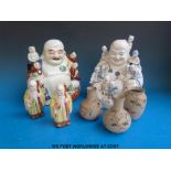 Two Chinese seated Buddhas with children and two Chinese immortal figures