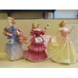 Three Royal Doulton figurines comprising two figures of the year, 'Jennifer' HN3447 1994,